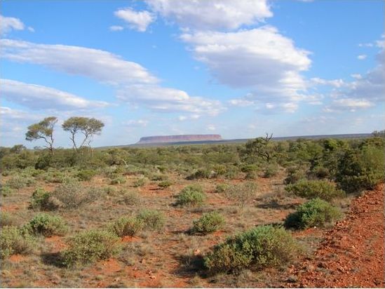 Photograph of Mount Connor, Central Australia, showing an odd shadow in the foreground